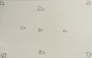 Small drawings of hearts against a plain white background.